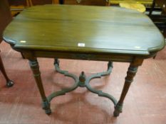 A 20th Century French walnut side table with shaped rectangular top on reeded and turned supports,