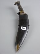 A brass mounted kukri with two smaller knives in a leather sheath, 37 cms the main knife