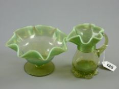 A Victorian vaseline glass jug and bowl set with frilly trailwork decoration