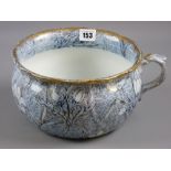 A Victorian floral and gilt decorated chamber pot marked 'Chintz' to the base, 23 cms diameter