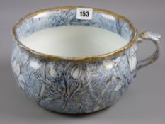 A Victorian floral and gilt decorated chamber pot marked 'Chintz' to the base, 23 cms diameter