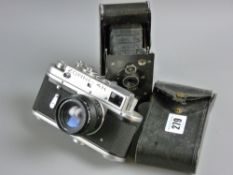 A Zorki 4K 35ml camera (uncased) and a cased Piccolette metal framed pocket folding camera in its