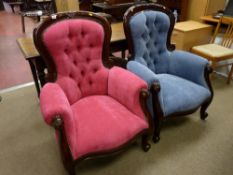 A pair of reproduction mahogany Victorian style button backed armchairs, one pink and one blue