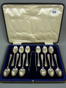 A good cased set of twelve hallmarked silver teaspoons with matching sugar tongs, Sheffield 1915