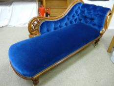 A Victorian mahogany chaise longue, refurbished and re-upholstered in a deep blue button back