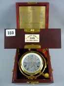 Joseph Sewill a 20851 gimballed clock in a dual lid, mahogany case with brass fittings and