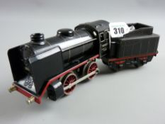 A Marklin gauge 0 R880 clockwork locomotive with tender in black and red livery, Marklin as a