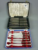 A cased set of Elkington & Co silver handled fruit knives of heavy quality, Birmingham 1960 and a