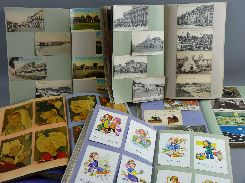 Vintage postcards - a large collection within seven scrap books of some twelve hundred plus