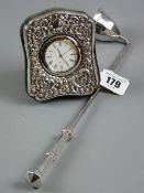 A silver fronted velvet framed Quartz bedroom clock, hallmarked Birmingham 1997 together with a