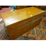 A CAMPHORWOOD LIDDED CHEST, scumble painted with brass carry handles, 49 x 96 x 43 cms