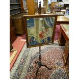 A GEORGIAN MAHOGANY POLESCREEN with classically scened rectangular framed panel on a finial capped