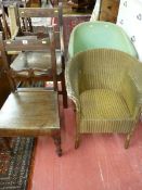 TWO ANTIQUE OAK FARMHOUSE CHAIRS and two Lloyd loom style armchairs