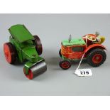 TWO TINPLATE CLOCKWORK VEHICLES a Gama West German tractor and driver with rubber wheels and