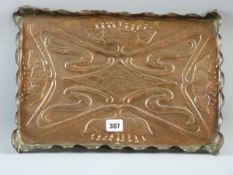AN ART NOUVEAU COPPER TRAY with raised crimped edge, embossed floral decoration with central