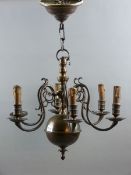 A SIX BRANCH CEILING LIGHT, early 20th Century European bronze effect ceiling light, the scroll work