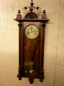 A VIENNA STYLE WALL CLOCK, late 19th Century walnut and ebonized wall clock, twin weight pendulum