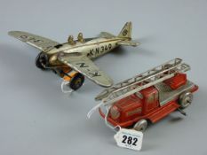 TWO GERMAN TINPLATE TOYS including a US-zone fire engine with tilting ladder, 15 cms, key