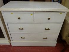 A PAINTED PINE CHEST of two short over two long drawers below a moulded top on a plinth base, 85 x