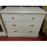 A PAINTED PINE CHEST of two short over two long drawers below a moulded top on a plinth base, 85 x