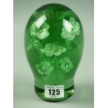 A VICTORIAN GREEN GLASS DUMP PAPERWEIGHT with interior flowers decoration and rough pontil base,