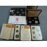 TWO PLASTIC FIVE COIN WALLETS, two red plush cased five coin packs 'Britain's First Decimal Coins'