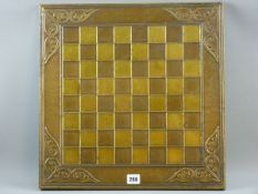 A CHESS BOARD IN THE ARTS & CRAFTS STYLE a copper and brass chess board decorated with floral