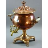 A COPPER SAMOVAR, mid 19th Century with brass tap and glass handles, 43 cms overall height