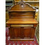 A NEAT VICTORIAN MAHOGANY CHIFFONIER, carved and panelled back with shaped shelf over a