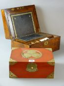 A VICTORIAN WALNUT WRITING SLOPE with brass plaque and escutcheon, 15.5 x 30 cms and an Oriental red