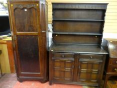 AN OAK SINGLE DOOR HALL ROBE AND A PRIORY STYLE OAK DRESSER with two frieze drawers and two lower