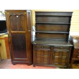 AN OAK SINGLE DOOR HALL ROBE AND A PRIORY STYLE OAK DRESSER with two frieze drawers and two lower