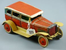 A CIRCA 1920 CLOCKWORK TINPLATE SEDAN CAR litho decorated 6 x 24 balloon tyres and body (