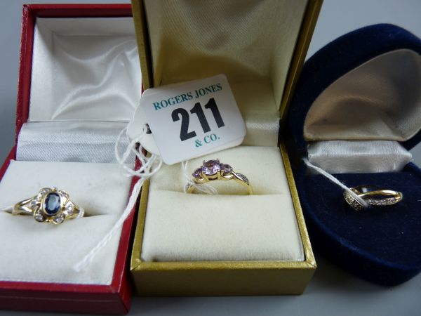 THREE NINE CARAT GOLD DRESS RINGS 5.7 grms total