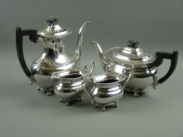 AN ELECTROPLATE FOUR PIECE VINERS TEA SET classically shaped with beaded rims, each piece raised