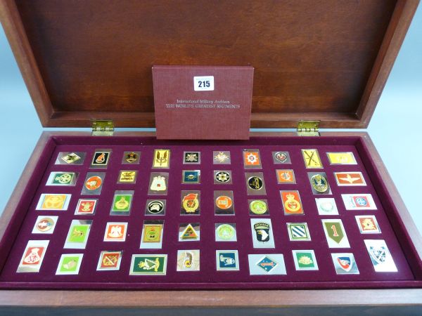 REGIMENTAL TABLETS, a cased set of fifty Franklin Mint enamel and non precious metal regimental