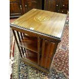 AN INLAID REVOLVING BOOKCASE, mahogany with box wood stringing, ivory and multi-wood inlay roundel