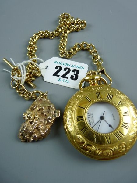 A SEWELLS HUNTER POCKET WATCH, a modern yellow metal encased Quartz hunter pocket watch with