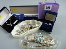 AN ASSORTMENT OF SILVER AND WHITE METAL JEWELLERY, mainly modern bracelets, brooches and rings to