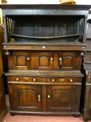 A FINE 18TH CENTURY TRIDARN, (three section cupboard), the blackened top section with turned