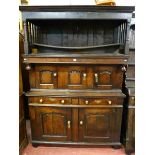 A FINE 18TH CENTURY TRIDARN, (three section cupboard), the blackened top section with turned