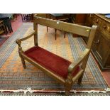 A VICTORIAN MAHOGANY OPEN BACKED BENCH, deep cross rail, swept arms on turned and block supports