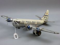 A TINPLATE PAN AM AIRWAYS PLANE made in Western Germany by Gama, a four prop friction driven