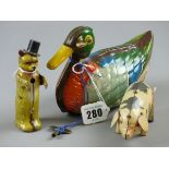 THREE TINPLATE CLOCKWORK ANIMALS including a dancing bear in bow tie and top hat (unknown maker),