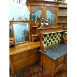 AN EDWARDIAN RED WALNUT THREE PIECE BEDROOM SUITE of two door mirrored wardrobe with lower drawer,