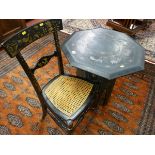 AN EASTERN BLACK LACQUERWORK FOLDING TABLE AND A CHINOISERIE DECORATED BEDROOM CHAIR, the