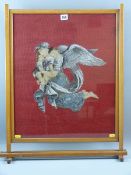 A VICTORIAN BEADWORK AND PETIT POINT NEEDLEWORK PANEL of a winged angel carrying two young children,