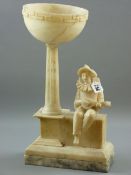 AN ALABASTER LAMP BASE carved as a mandolin playing Pierrot seated on a wall, square based reeded