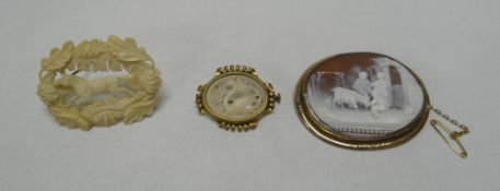 AN OVAL CAMEO BROOCH & TWO IVORY WORKED BROOCHES, the good quality cameo having an unusual depiction