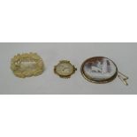 AN OVAL CAMEO BROOCH & TWO IVORY WORKED BROOCHES, the good quality cameo having an unusual depiction